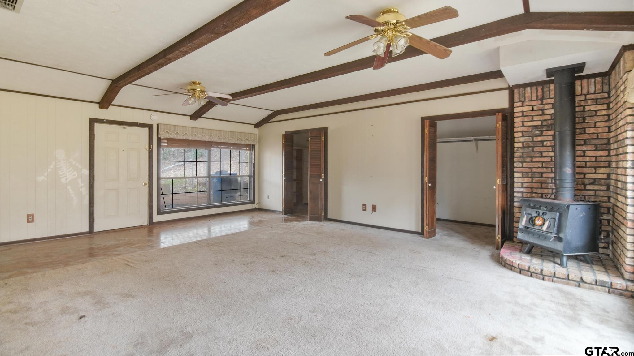 130 Golfcrest Drive Rusk, TX 75785 - Photo 6 of 23 a view of an empty room with a window