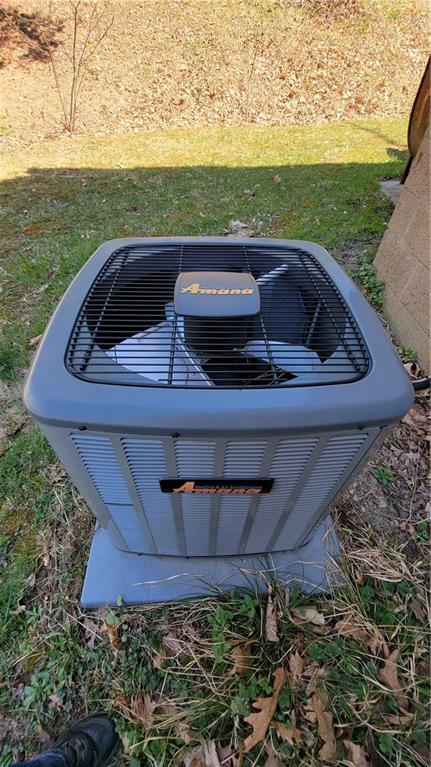 576 Lardintown Road Sarver, PA 16055 - Photo 16 of 16 a view of a yard with table and chairs under an umbrella