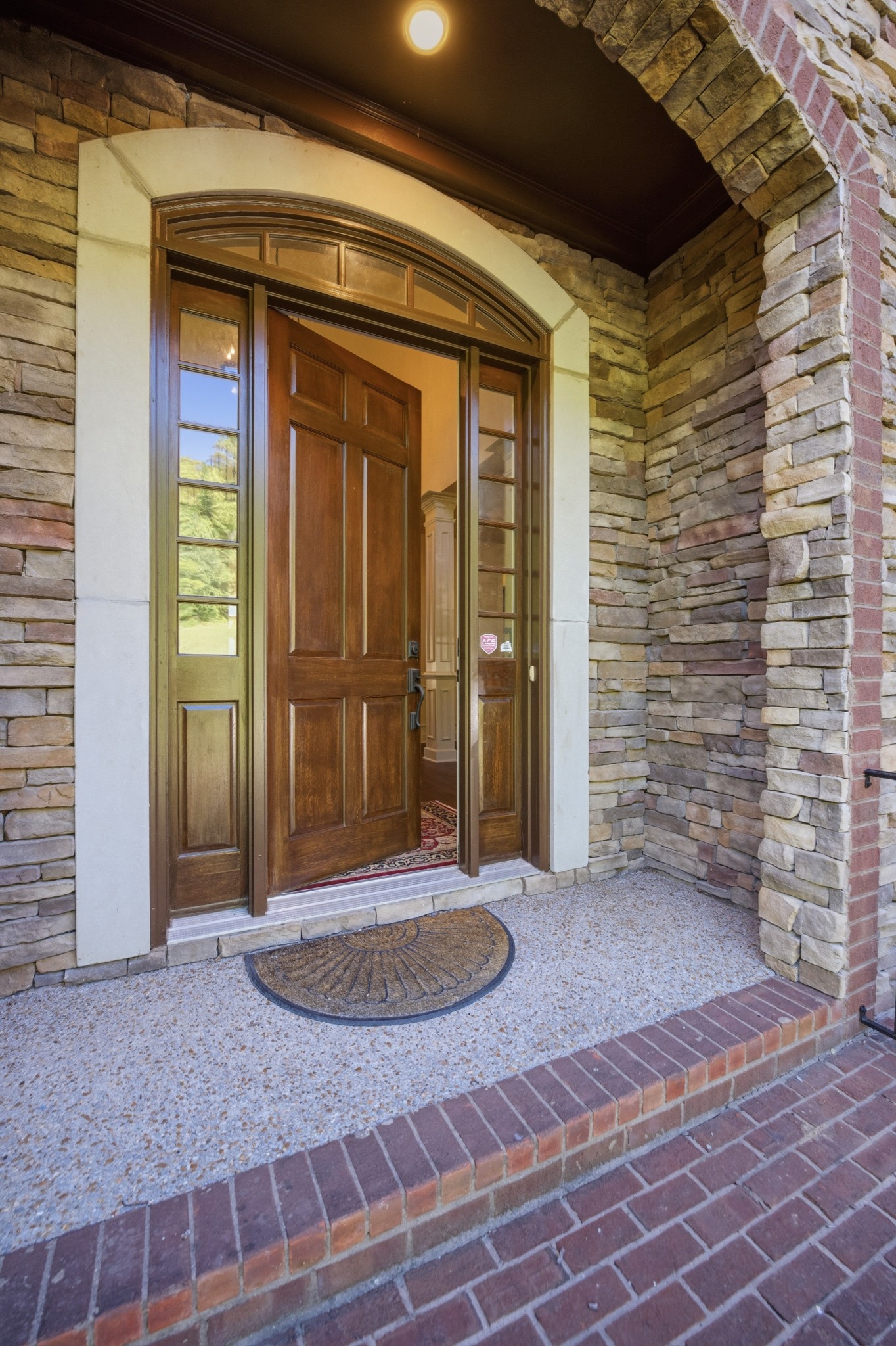 319 Hamlets End Way Franklin, TN 37067 - Photo 6 of 54 a view of a porch with a table and chairs