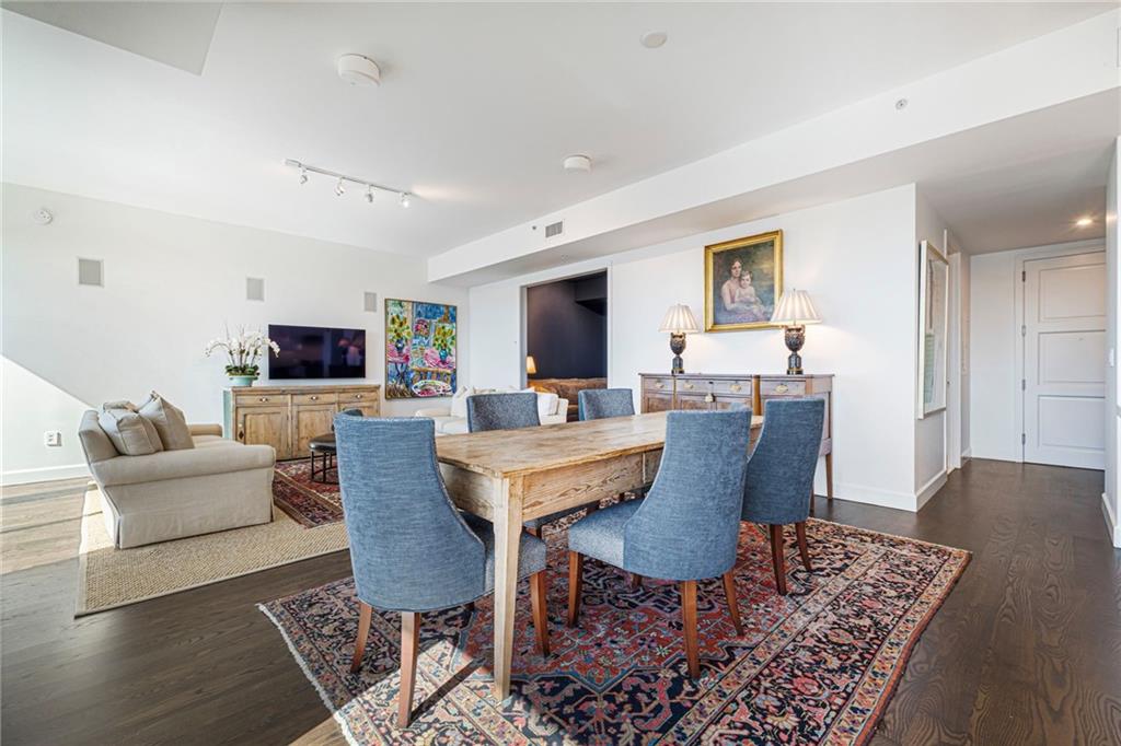 1820 Peachtree Road Northwest, Unit 1510 Atlanta, GA 30309 - Photo 13 of 75 a view of a dining room with furniture