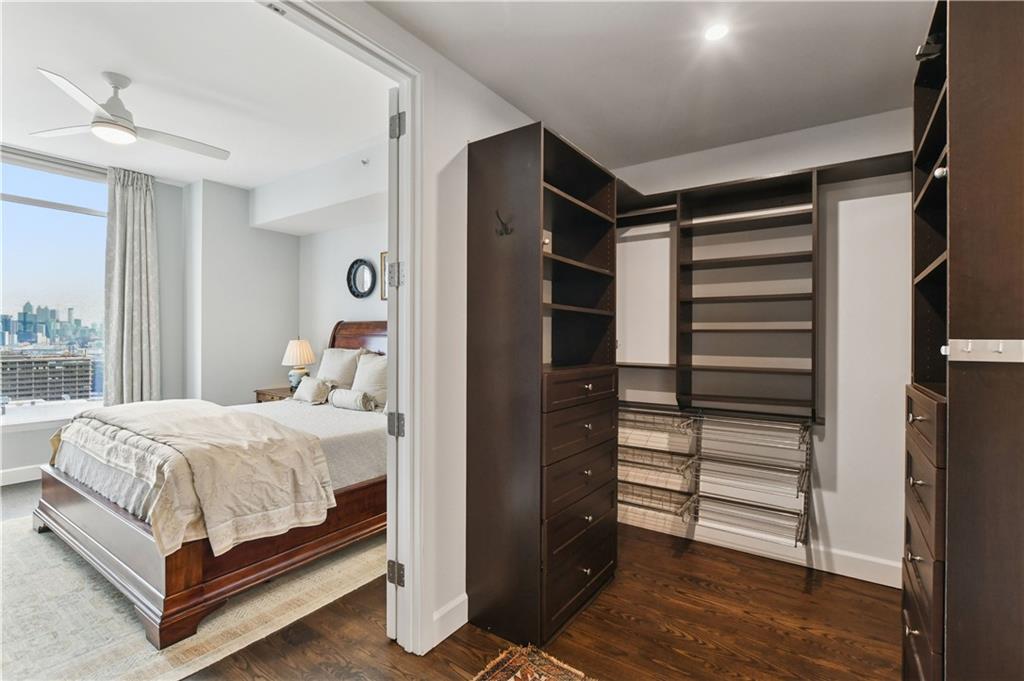 1820 Peachtree Road Northwest, Unit 1510 Atlanta, GA 30309 - Photo 29 of 75 a bedroom with a bed and a window