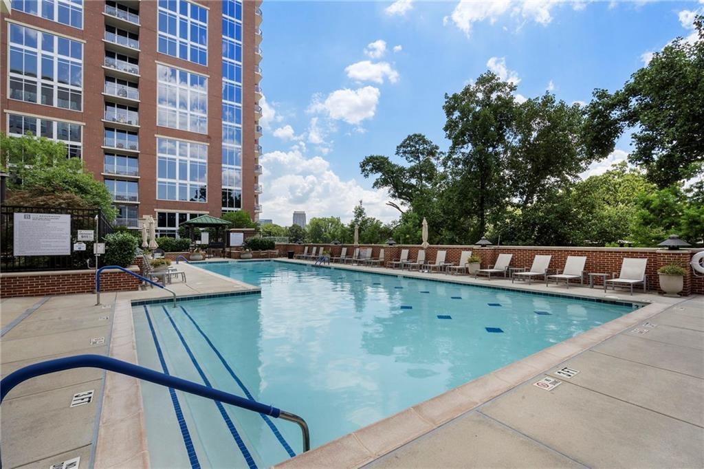 1820 Peachtree Road Northwest, Unit 1510 Atlanta, GA 30309 - Photo 42 of 75 a balcony view with two chairs and a table