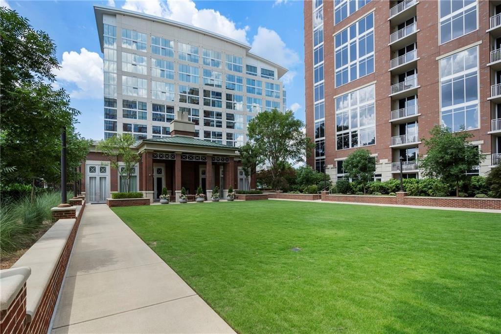 1820 Peachtree Road Northwest, Unit 1510 Atlanta, GA 30309 - Photo 51 of 75 a front view of a building with a garden