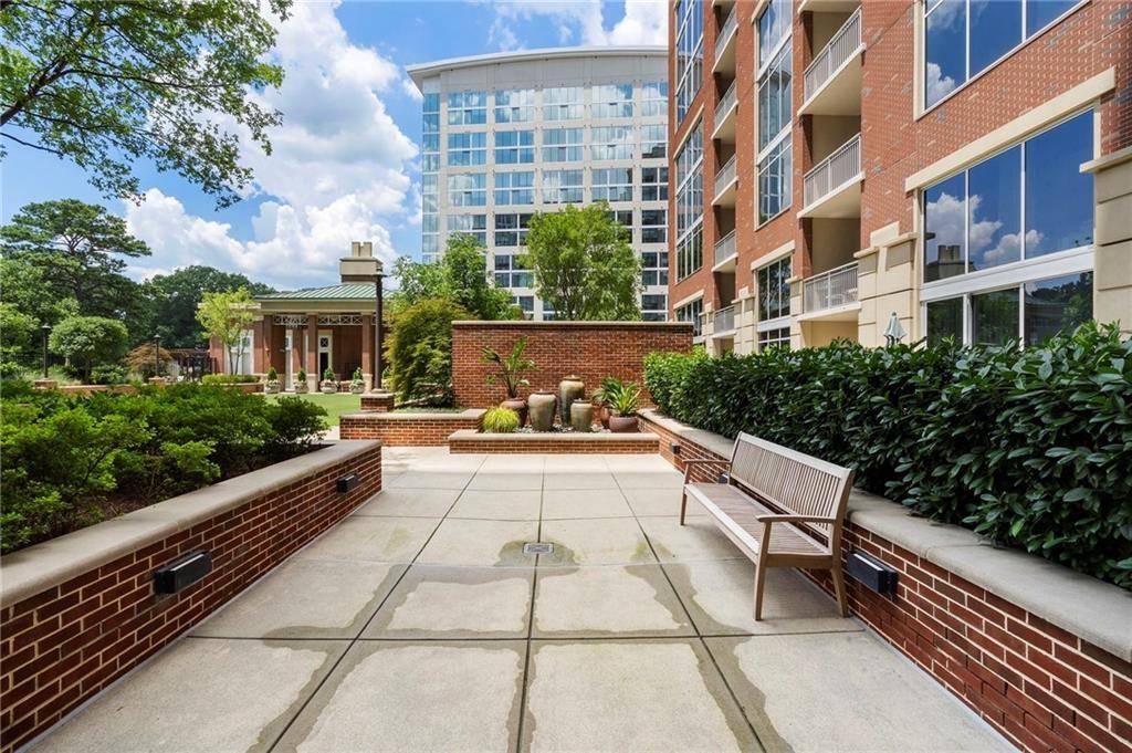 1820 Peachtree Road Northwest, Unit 1510 Atlanta, GA 30309 - Photo 56 of 75 a view of building with a outdoor seating