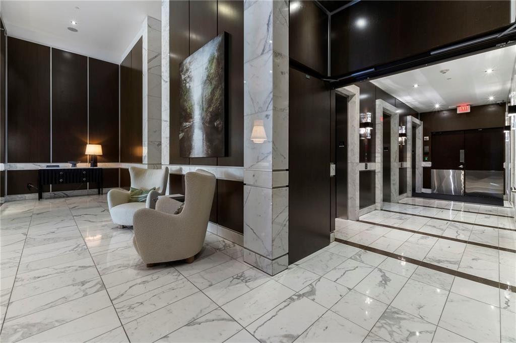 1820 Peachtree Road Northwest, Unit 1510 Atlanta, GA 30309 - Photo 65 of 75 a lobby with furniture and window