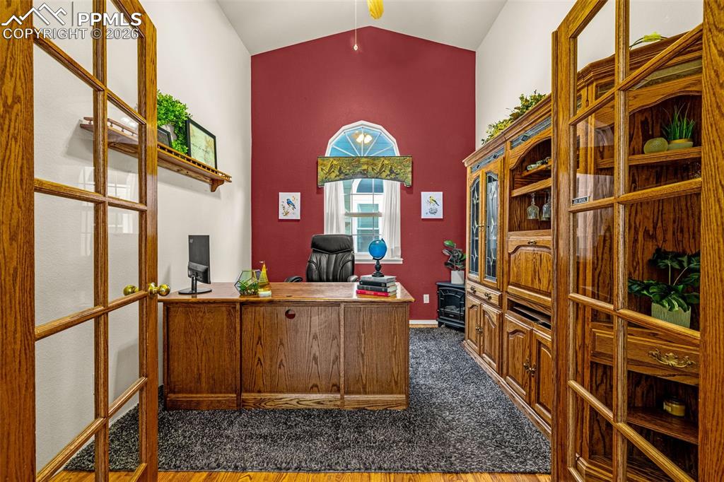 1310 Bison Ridge Drive Colorado Springs, CO 80919 - Photo 24 of 45 a view of a living room with a large window