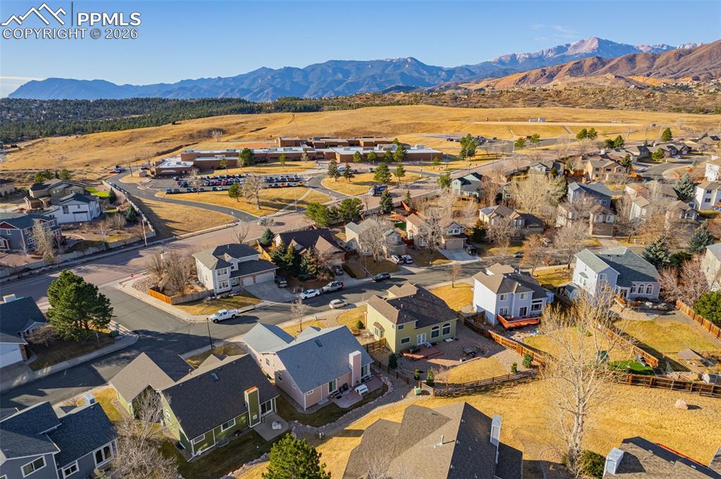 1310 Bison Ridge Drive Colorado Springs, CO 80919 - Photo 41 of 45 an aerial view of residential houses with outdoor space
