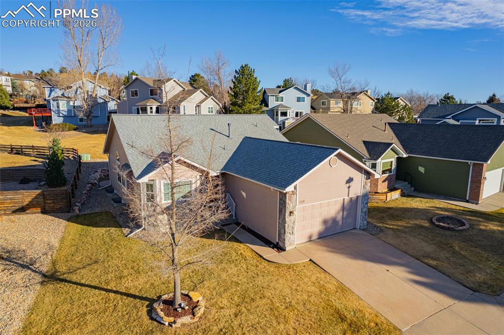 1310 Bison Ridge Drive Colorado Springs, CO 80919 - Photo 43 of 45 a view of a terrace with chairs