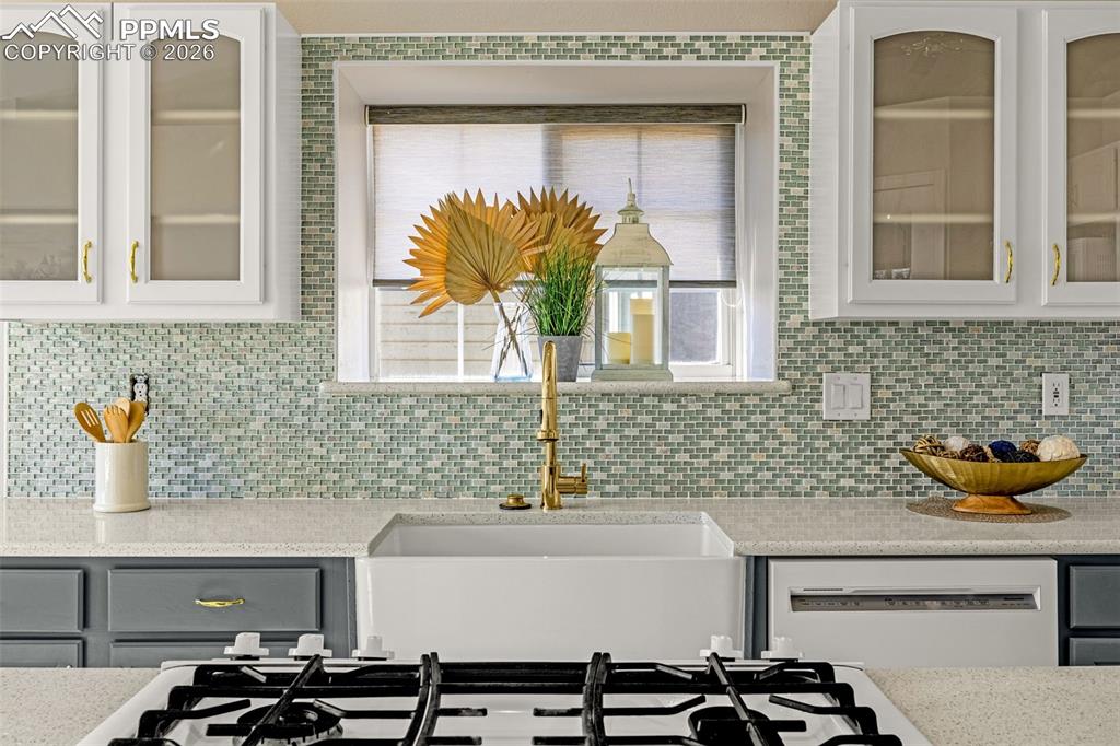 1310 Bison Ridge Drive Colorado Springs, CO 80919 - Photo 10 of 45 a bathroom with a sink and a mirror