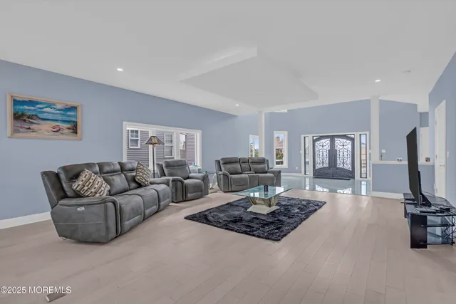 a view of a livingroom with furniture and a fireplace