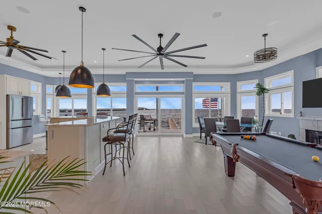 a kitchen with white cabinets and a sink