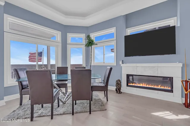 a view of room with window and ceiling fan