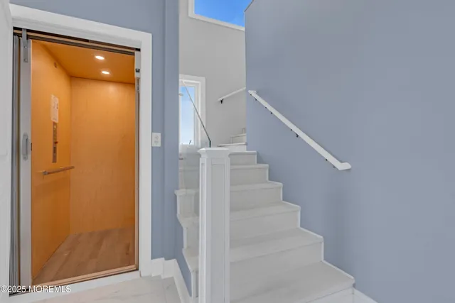 an aerial view of houses with outdoor space