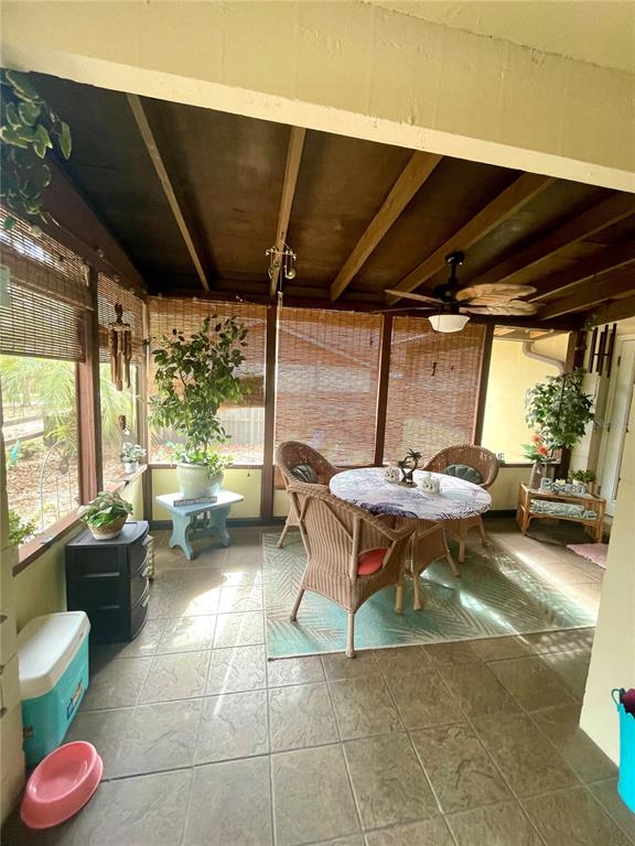 127 Cypress Pond Road Port Orange, FL 32128 - Photo 17 of 68 a backyard of a house with table and chairs