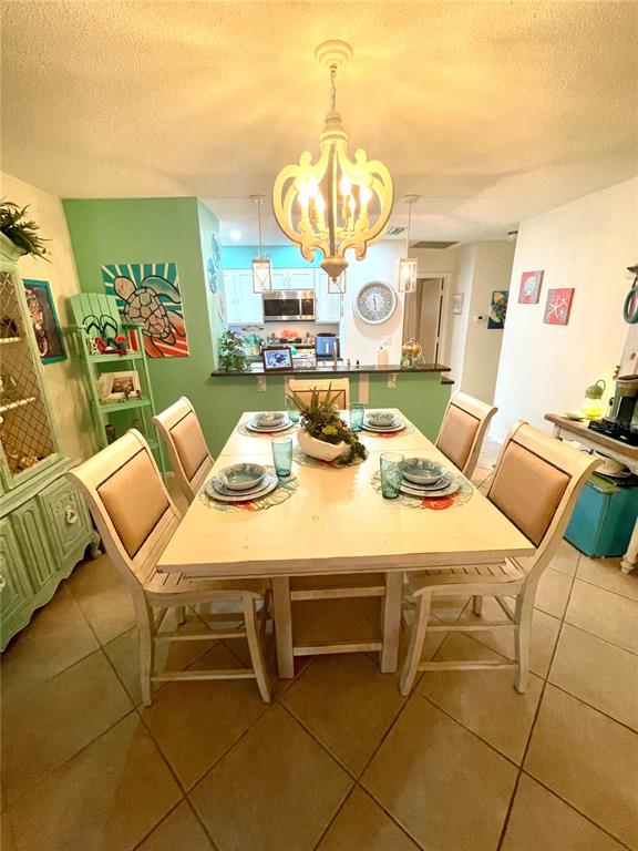 127 Cypress Pond Road Port Orange, FL 32128 - Photo 22 of 68 a view of a dining room with furniture
