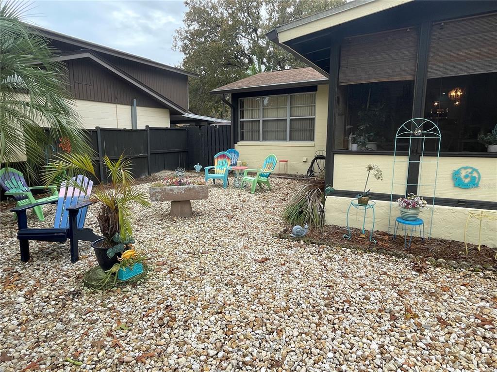 127 Cypress Pond Road Port Orange, FL 32128 - Photo 3 of 68 a backyard of a house with yard and outdoor seating