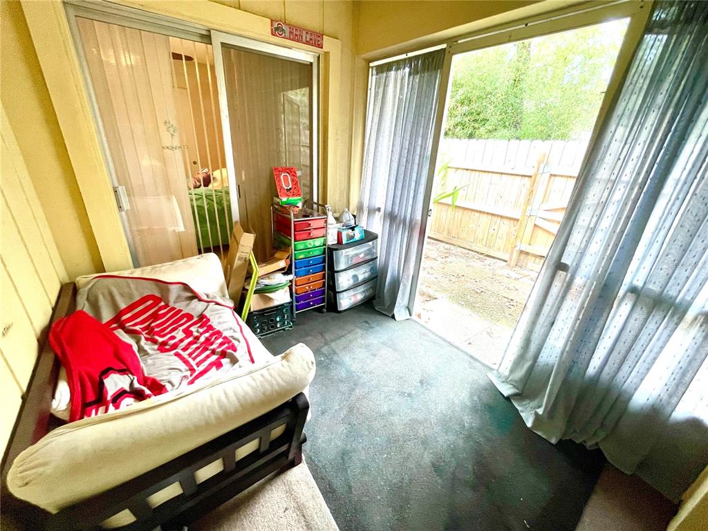 127 Cypress Pond Road Port Orange, FL 32128 - Photo 46 of 68 a bedroom with a bed and a window