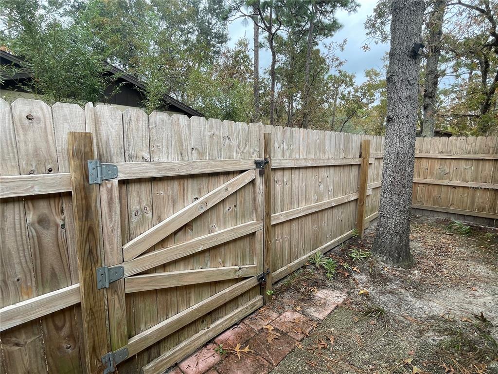 127 Cypress Pond Road Port Orange, FL 32128 - Photo 50 of 68 a view of wooden fence with wooden fence