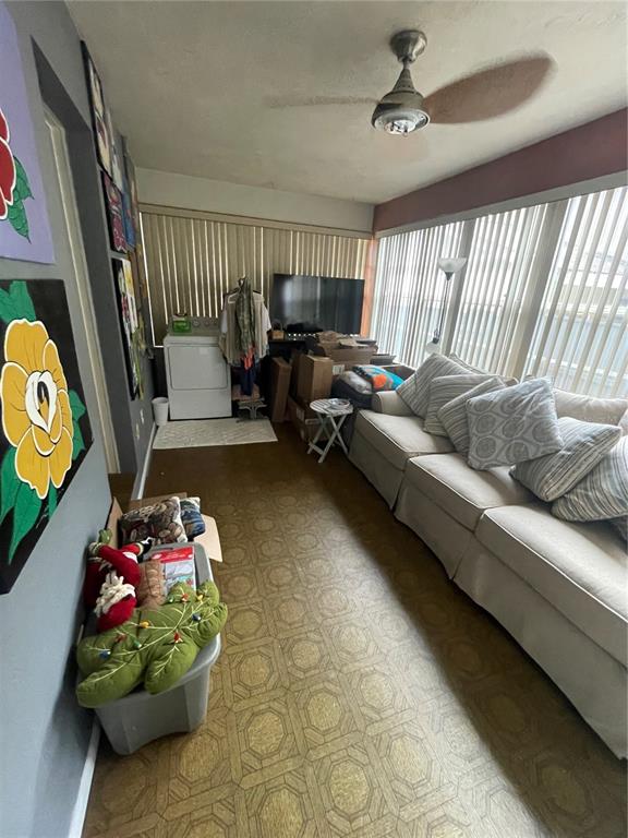 127 Cypress Pond Road Port Orange, FL 32128 - Photo 66 of 68 a living room with furniture and a window