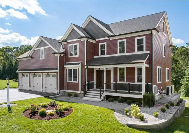 a view of a house with a swimming pool and a yard