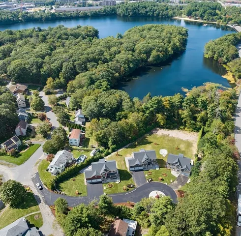 an aerial view of lake residential house with outdoor space