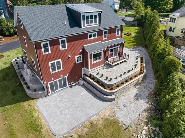 an aerial view of a house with balcony