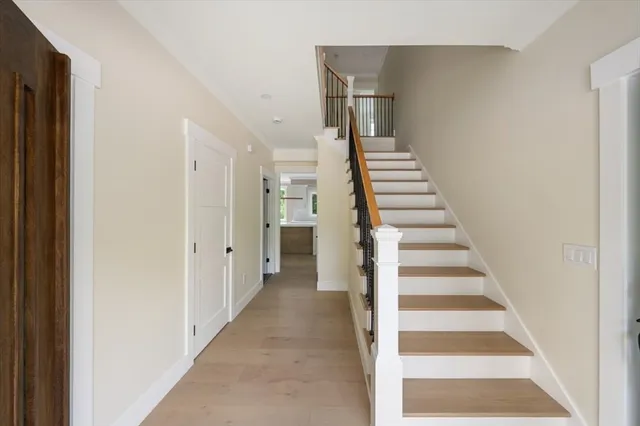 a view of a hallway with front door