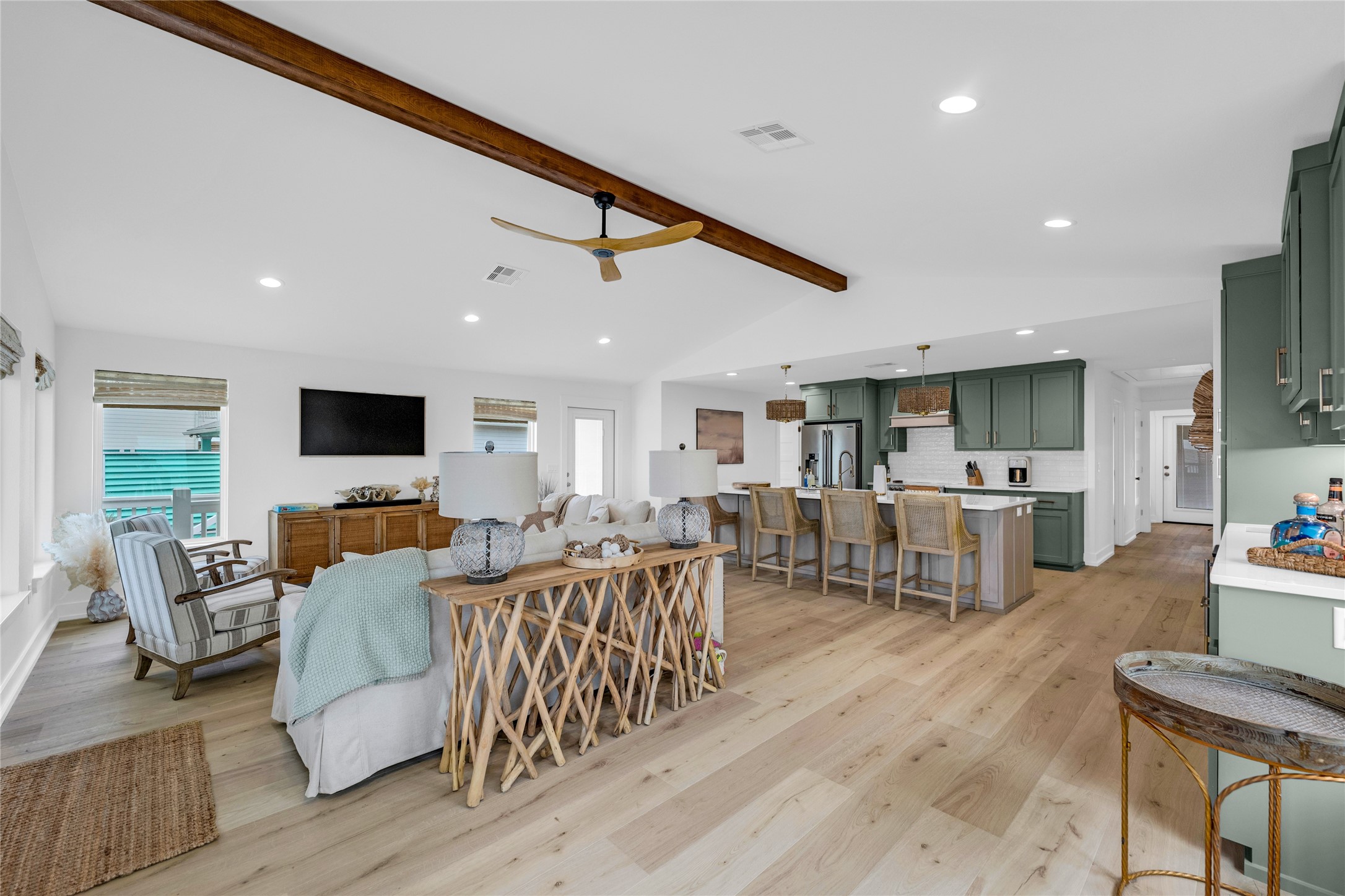 2477 Gilmore Crystal Beach, TX 77650 - Photo 11 of 40 a living room with lots of furniture and view of kitchen