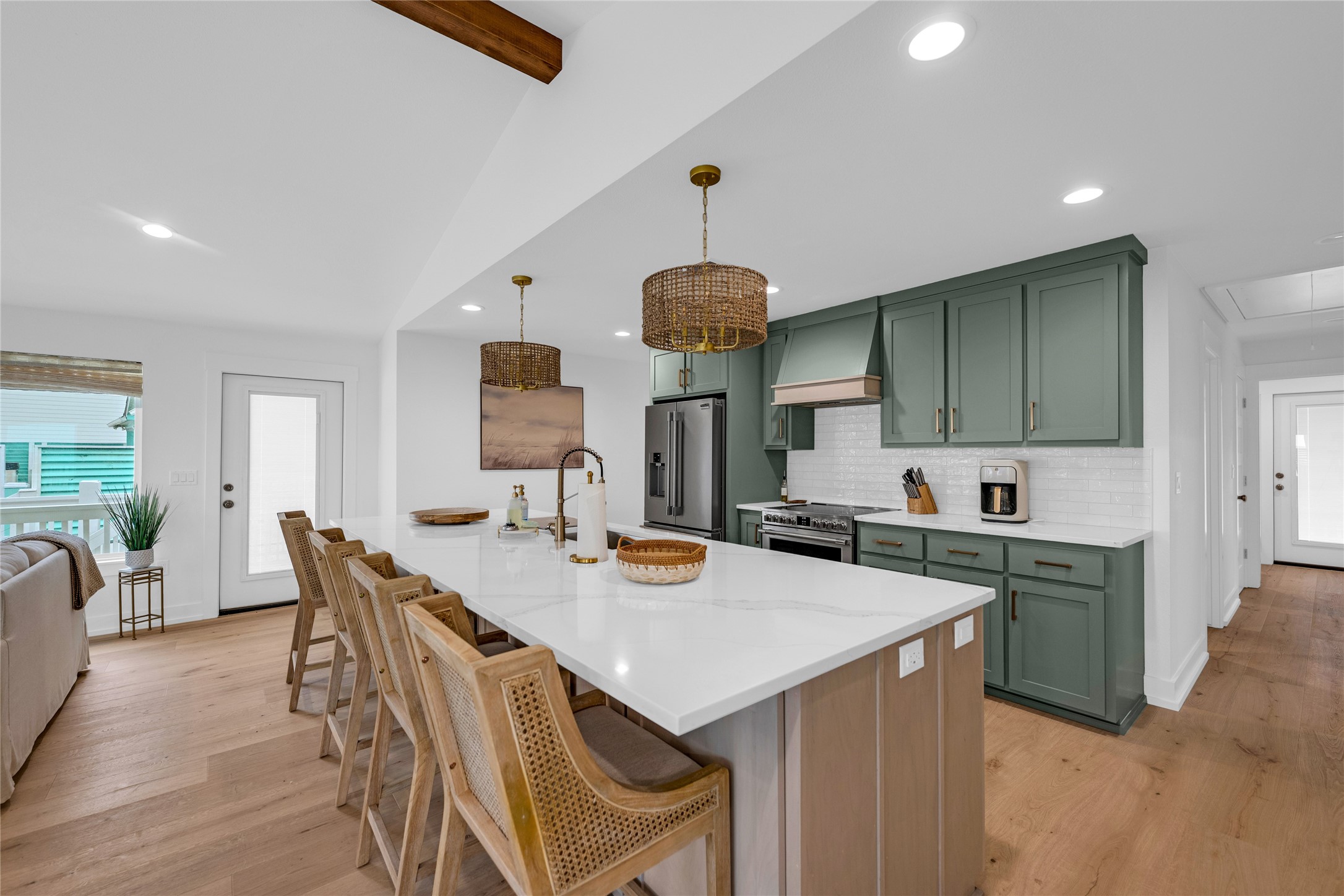 2477 Gilmore Crystal Beach, TX 77650 - Photo 12 of 40 a kitchen with a table and chairs in it