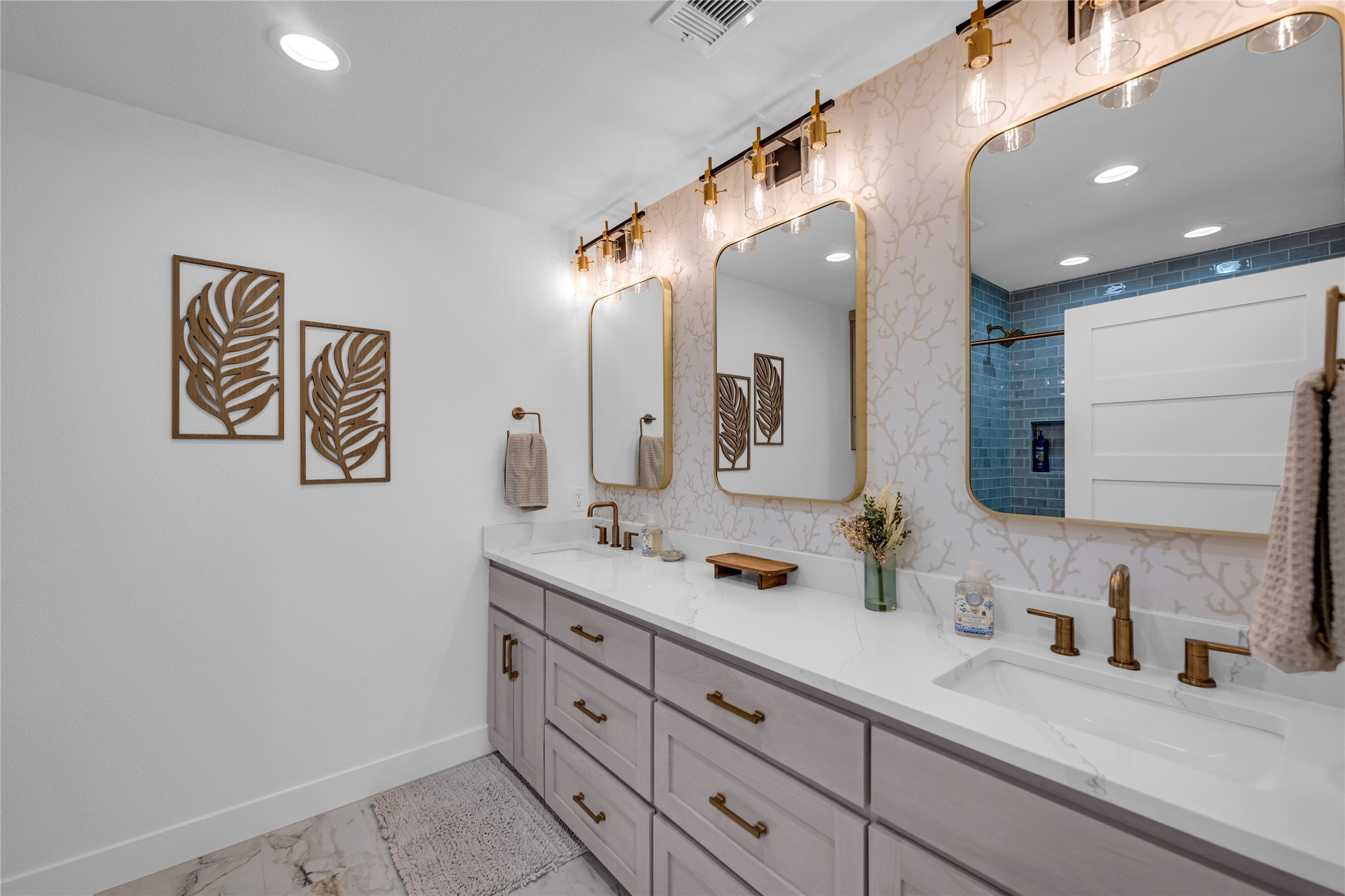 2477 Gilmore Crystal Beach, TX 77650 - Photo 20 of 40 a bathroom with a granite countertop sink mirror and vanity