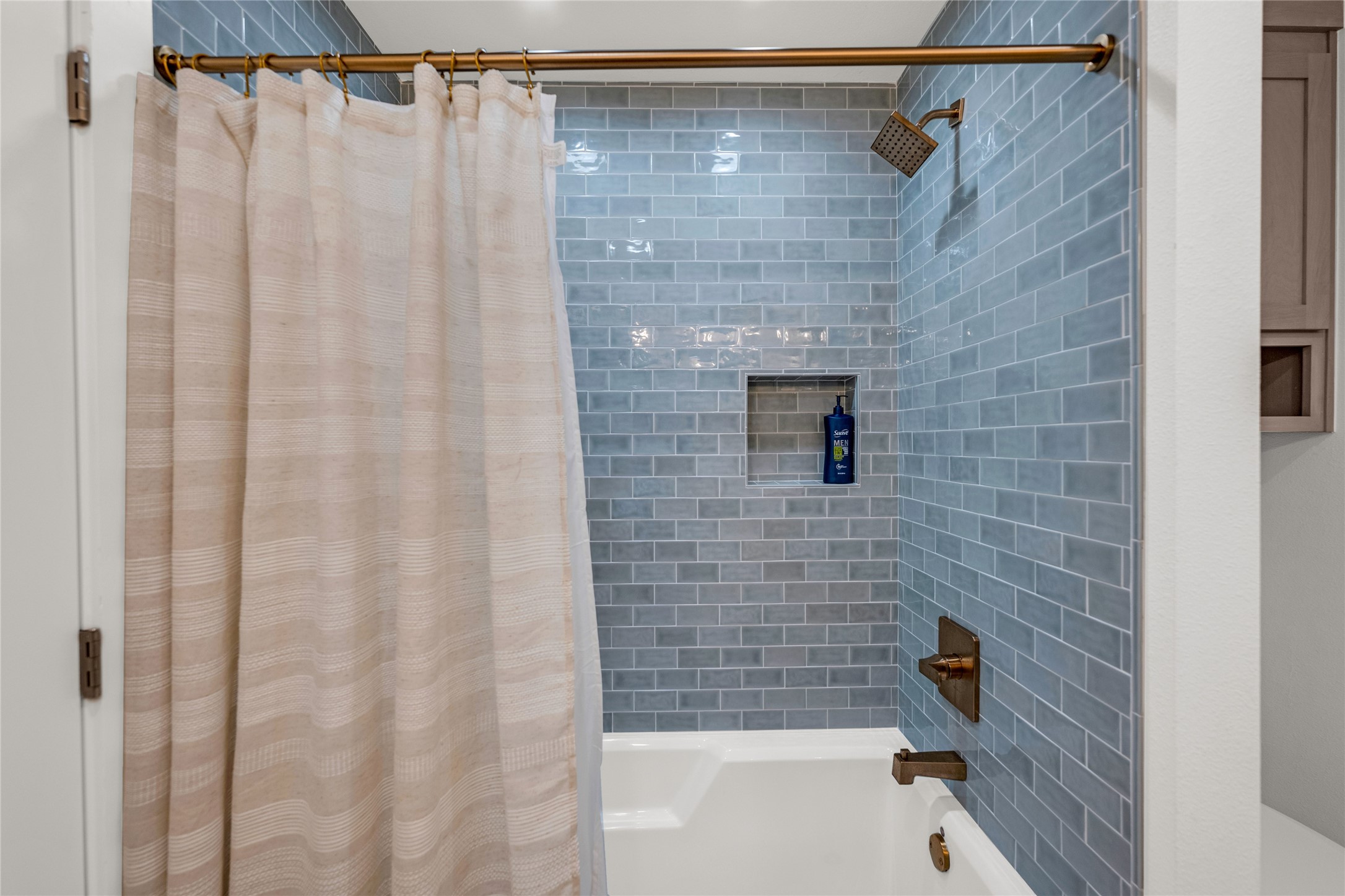 2477 Gilmore Crystal Beach, TX 77650 - Photo 21 of 40 a bathroom with a shower and a tub