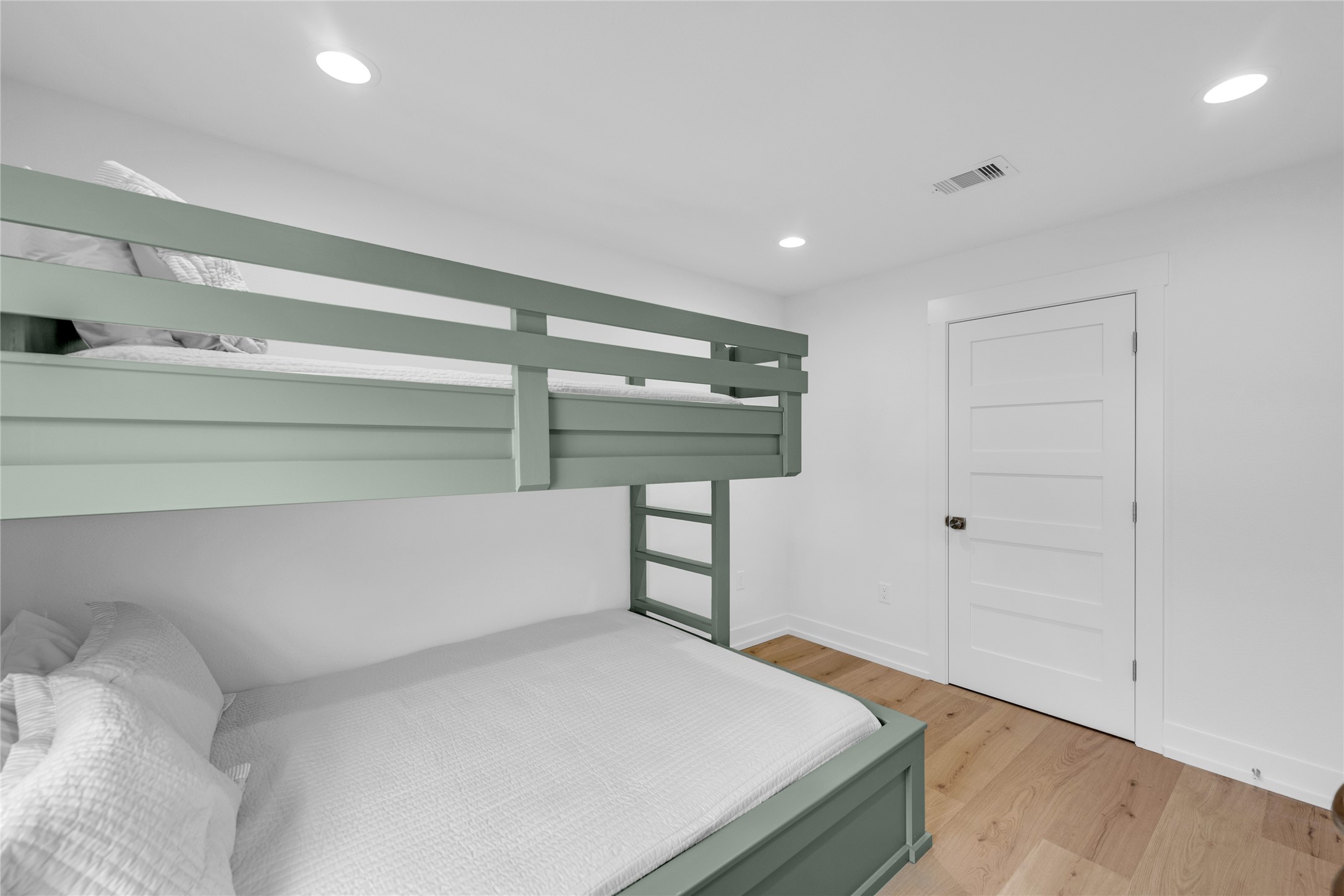 2477 Gilmore Crystal Beach, TX 77650 - Photo 28 of 40 a bedroom with a bed and a window