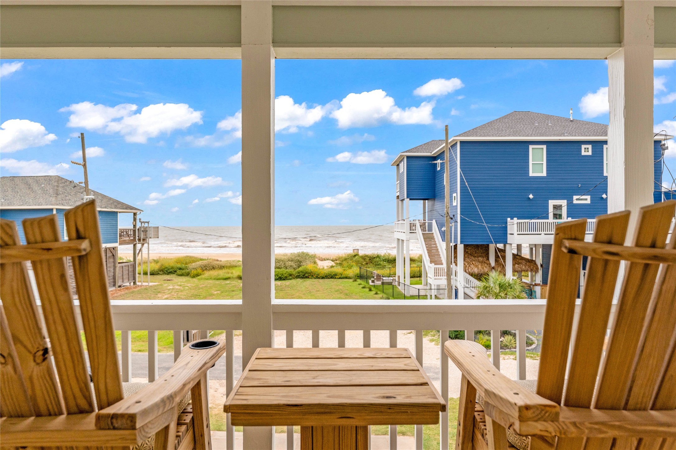 2477 Gilmore Crystal Beach, TX 77650 - Photo 4 of 40 a view of an chairs and table in the balcony