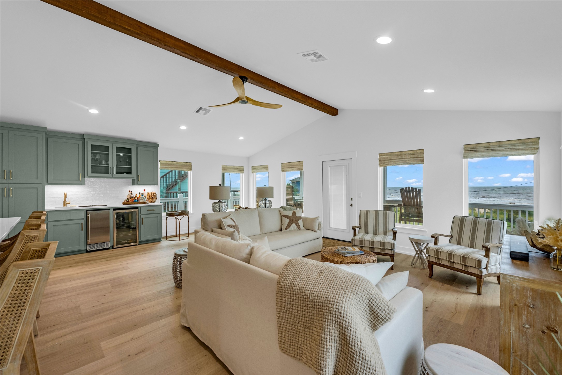 2477 Gilmore Crystal Beach, TX 77650 - Photo 10 of 40 a living room with furniture kitchen view and a large window