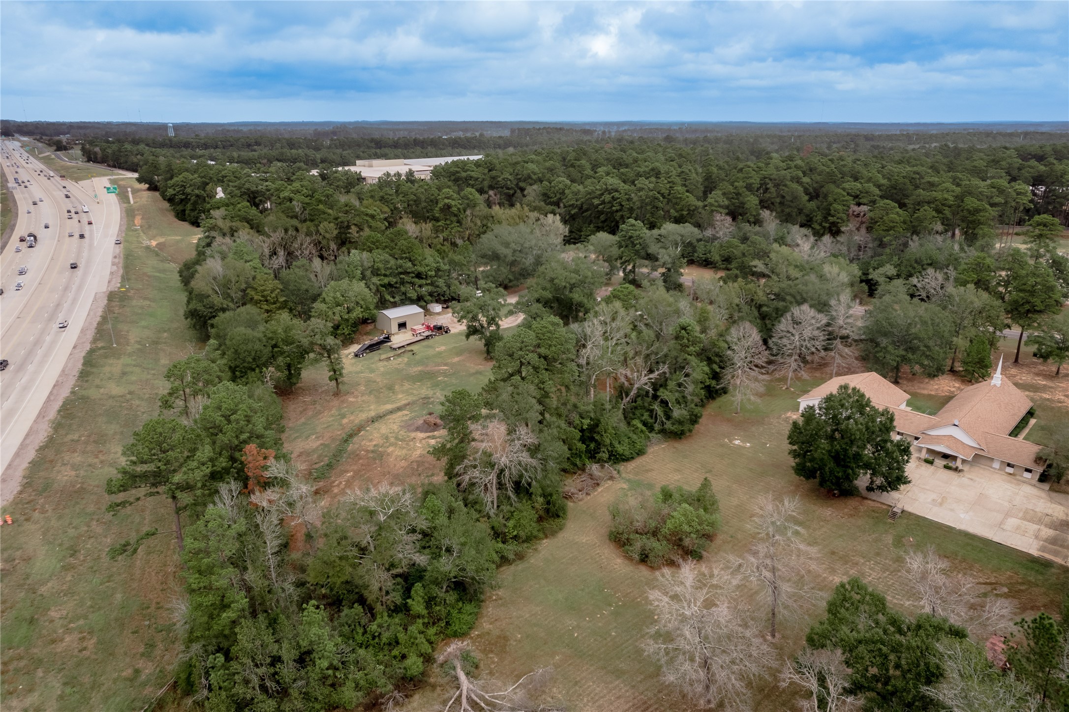 7640 Highway 75 Huntsville, TX 77340 - Photo 16 of 49 an aerial view of a houses with outdoor space