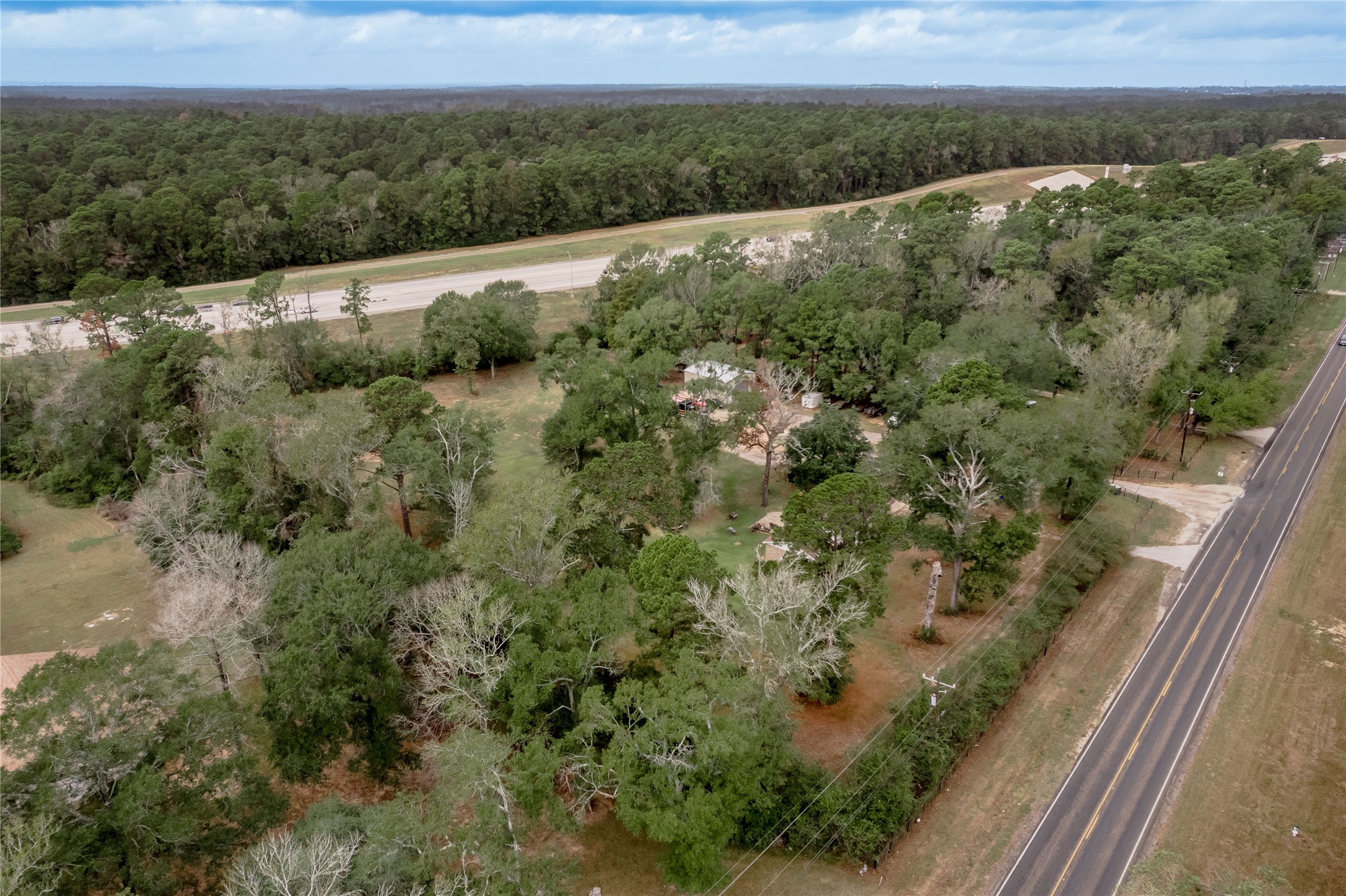 7640 Highway 75 Huntsville, TX 77340 - Photo 17 of 49 an aerial view of mountain with trees