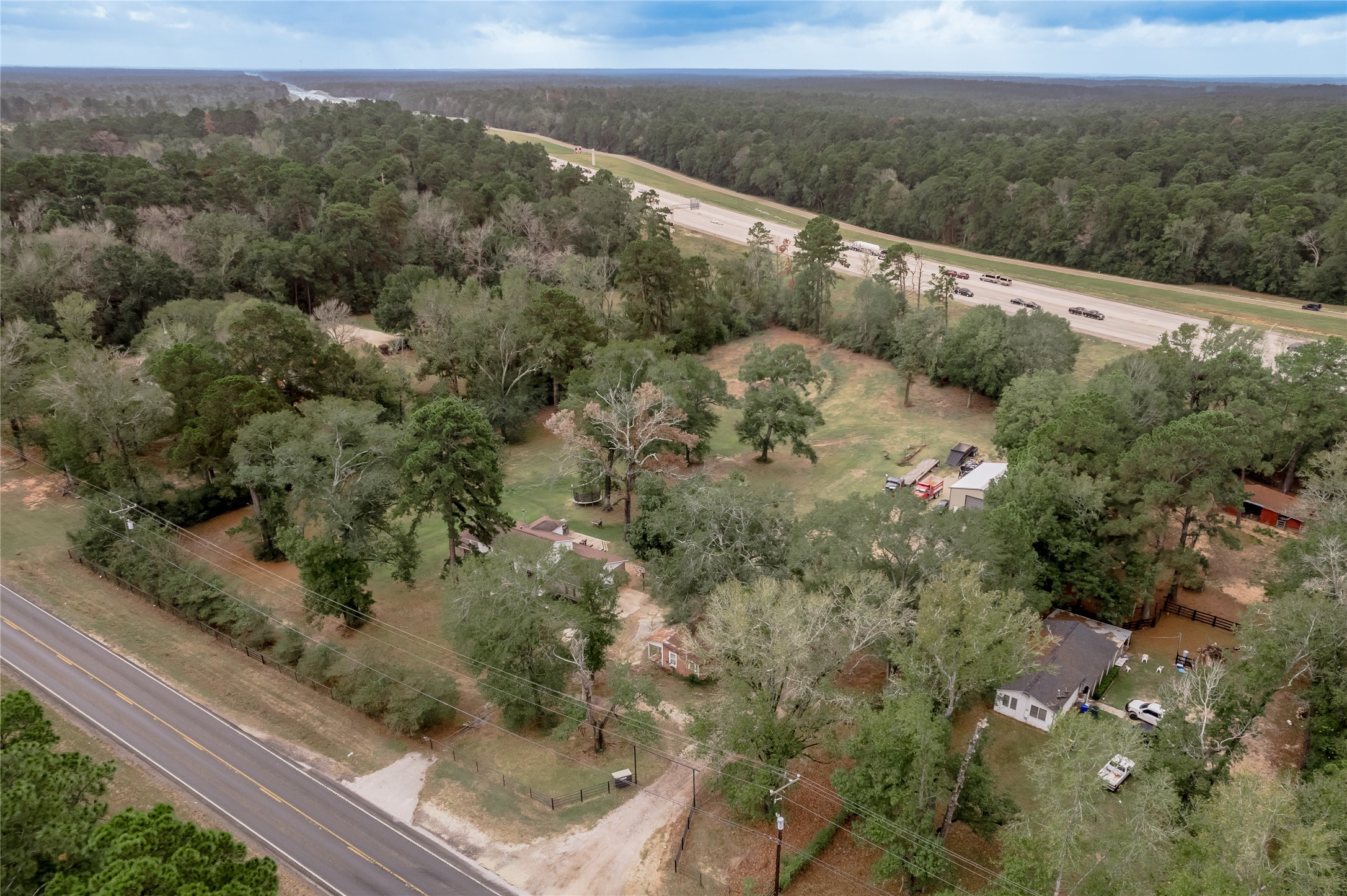 7640 Highway 75 Huntsville, TX 77340 - Photo 19 of 49 a view of a forest from a balcony