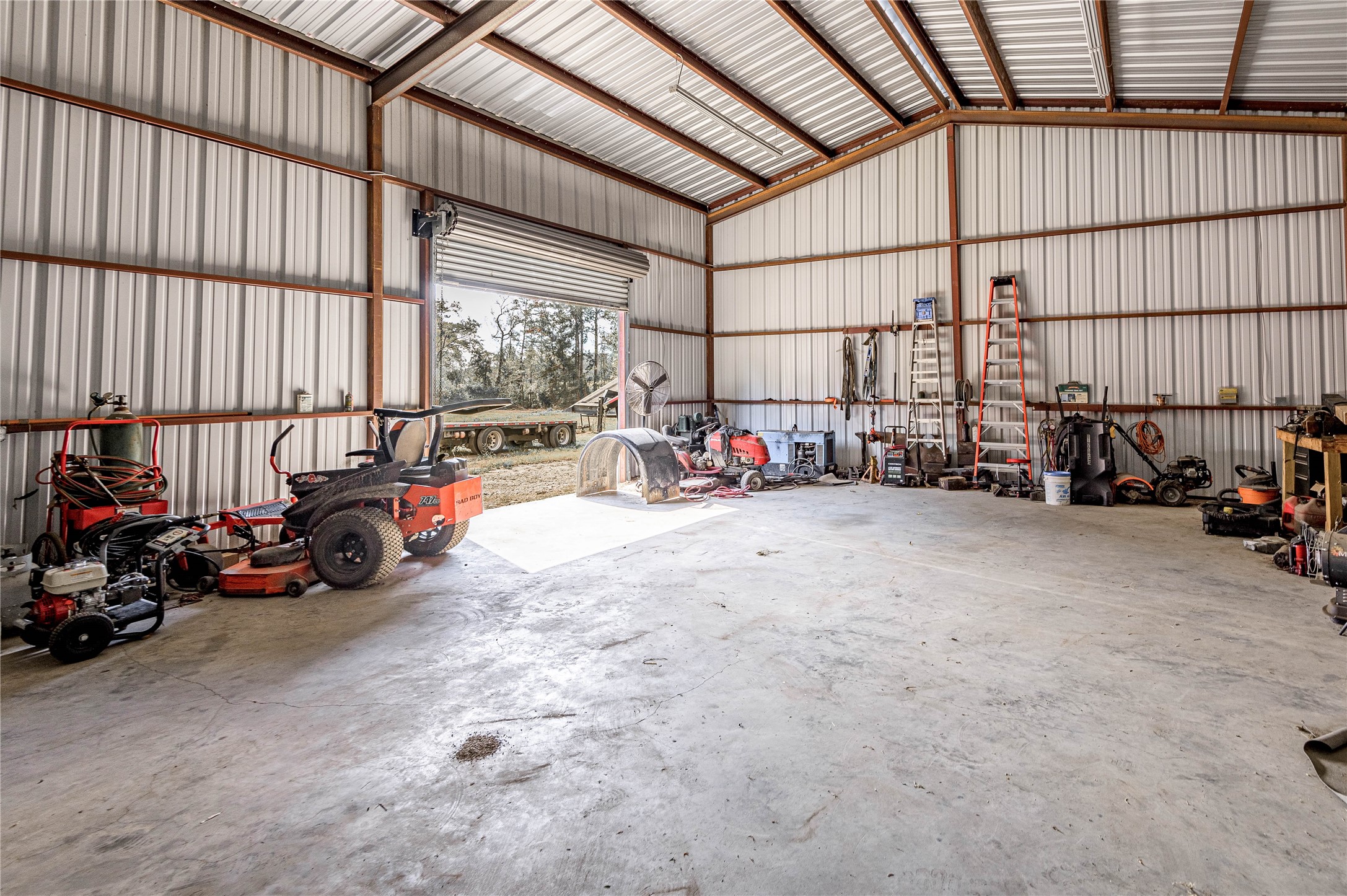 7640 Highway 75 Huntsville, TX 77340 - Photo 25 of 49 a view of garage with cars