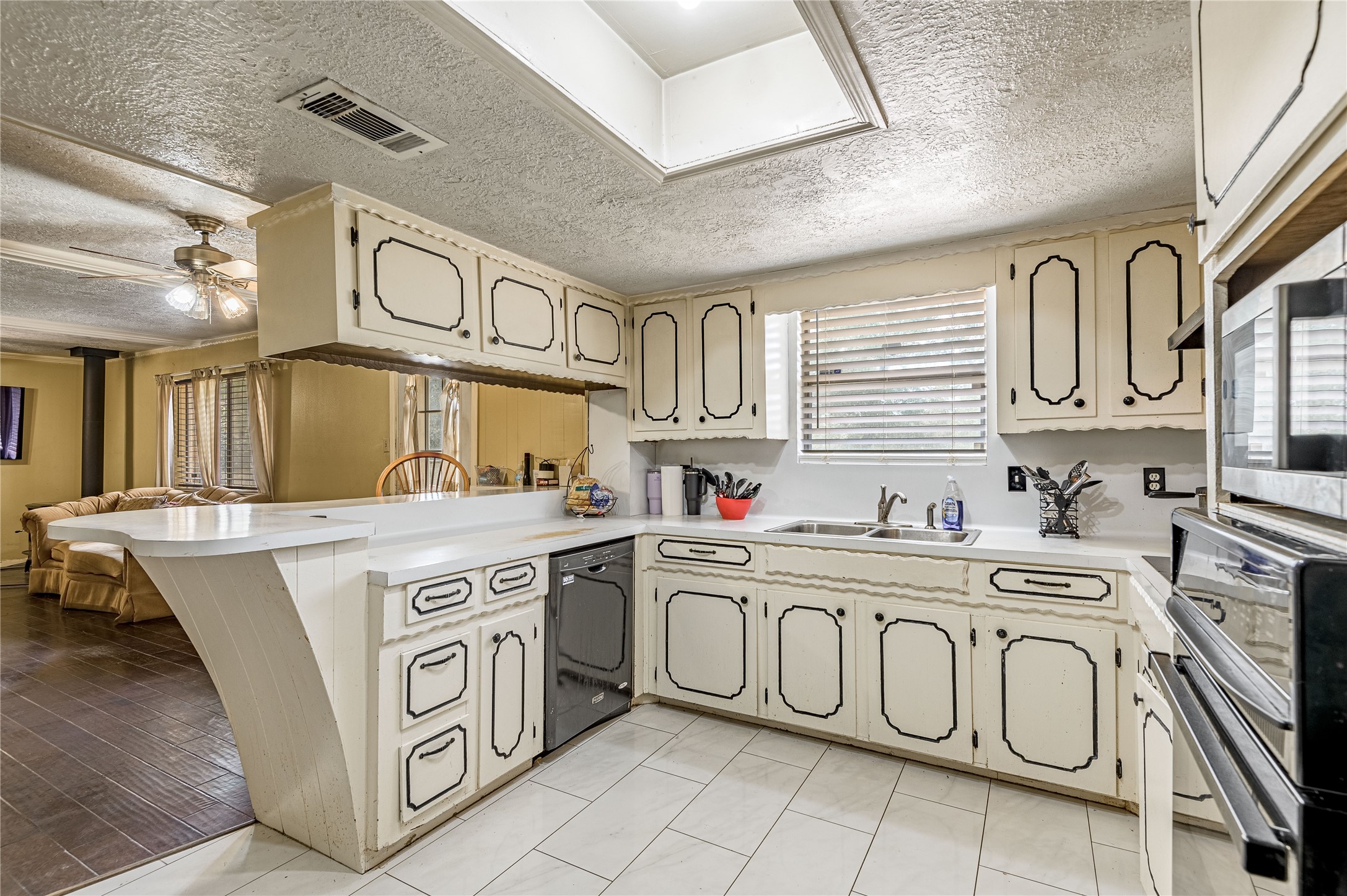 7640 Highway 75 Huntsville, TX 77340 - Photo 39 of 49 a kitchen with stainless steel appliances granite countertop a sink and cabinets