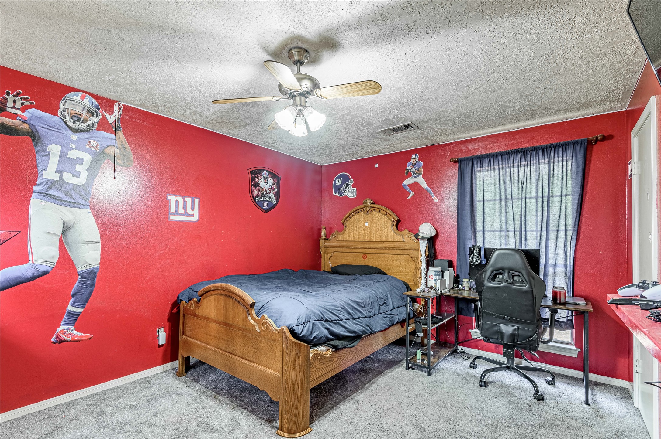 7640 Highway 75 Huntsville, TX 77340 - Photo 43 of 49 a bedroom with a bed and window