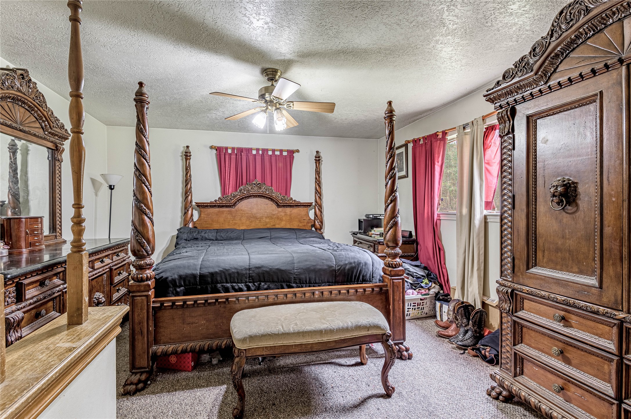 7640 Highway 75 Huntsville, TX 77340 - Photo 49 of 49 a bedroom with furniture and a window