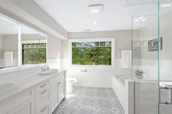 a bathroom with a sink a toilet and a bathtub