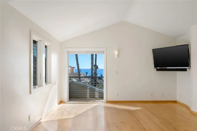 a view of livingroom with furniture and flat screen tv