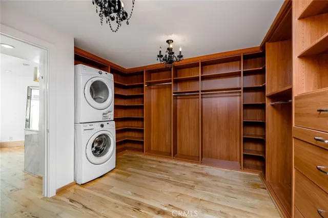 a view of a storage & utility room with washer and dryer