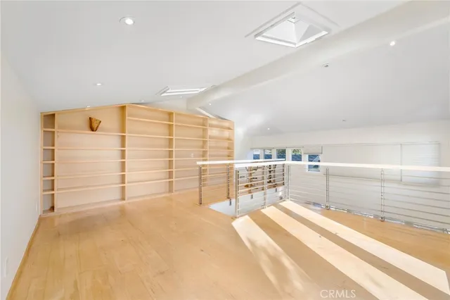 a view of a balcony with a potted plants