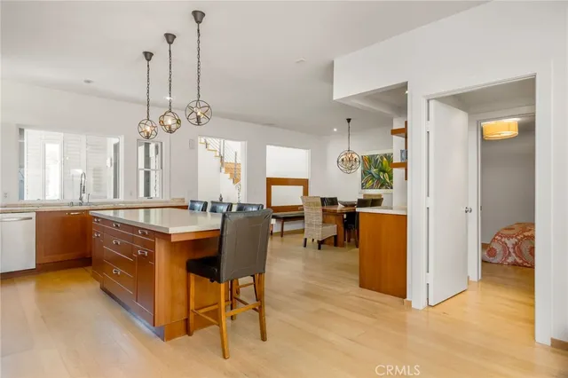 a view of a kitchen and dining table