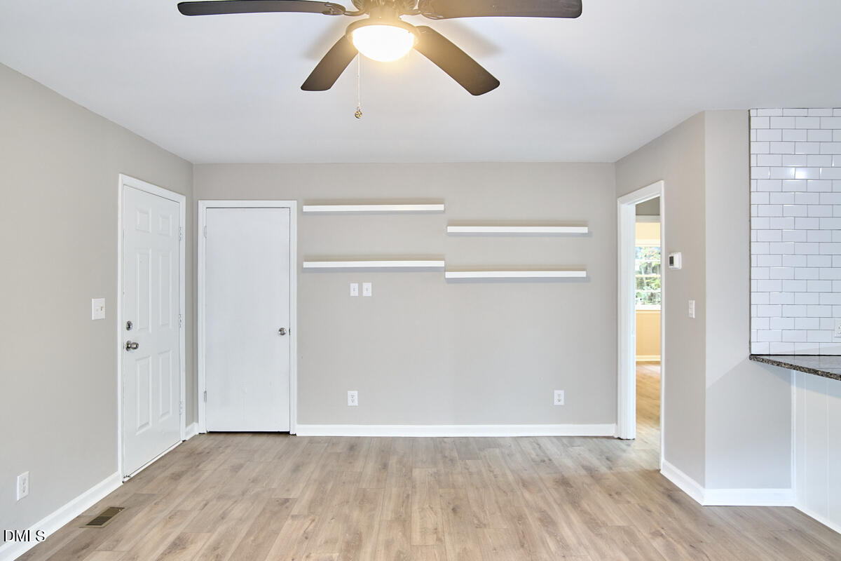 2128 Strebor Street Durham, NC 27705 - Photo 17 of 51 wooden floor in an empty room
