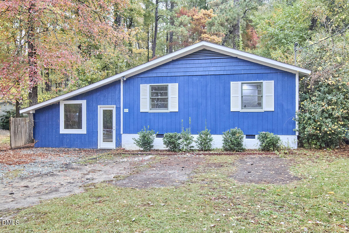 2128 Strebor Street Durham, NC 27705 - Photo 2 of 51 a view of a house with a yard