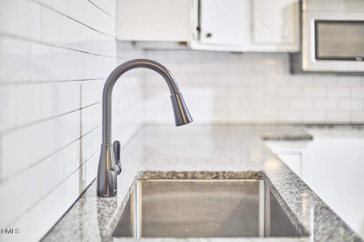 2128 Strebor Street Durham, NC 27705 - Photo 27 of 51 a close view of tap