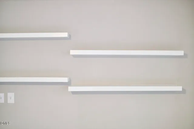 a kitchen with granite countertop a sink a stove and a microwave